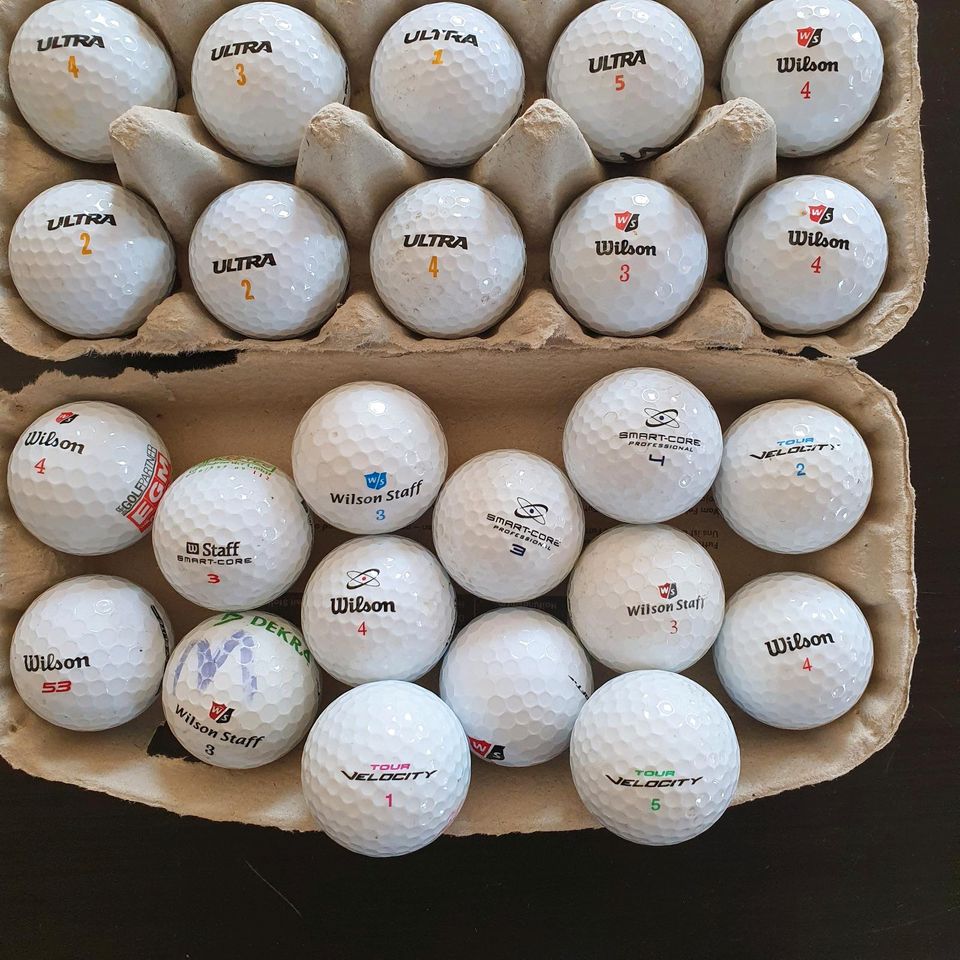 Golfbälle Wilson, 24 Stück gemischt. Keine Lakeballs. in Bichl