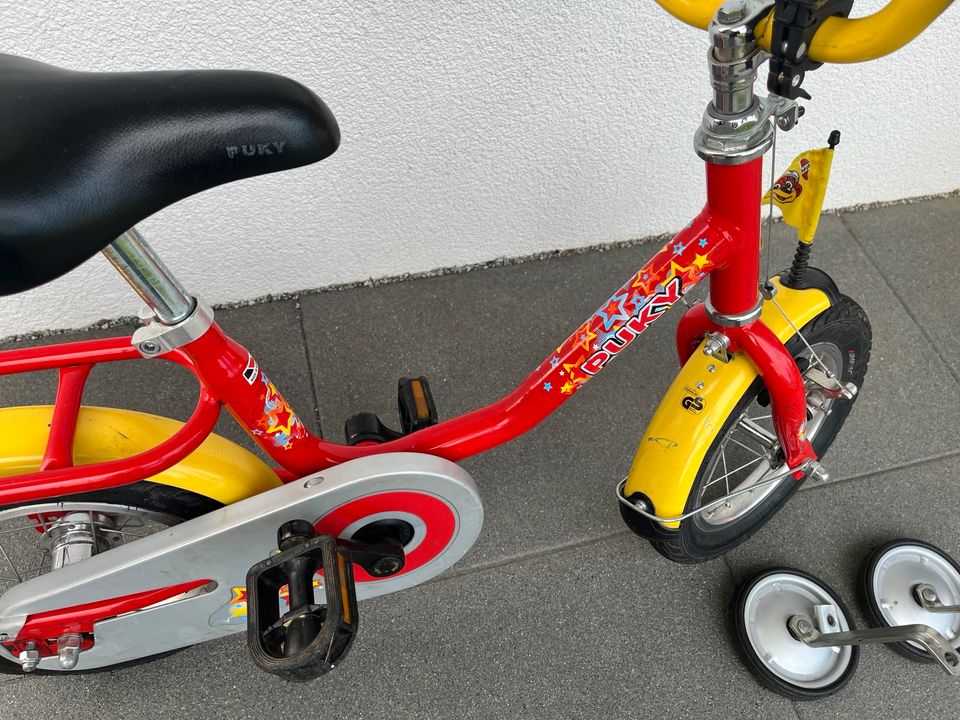 Puky Fahrrad 12 Zoll Rot-Gelb mit Stützrädern, Licht & Helm in Neschwitz