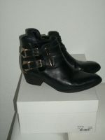 NP 395€ (mit Karton) Sandro cut out Boots 38 schwarz gold Nordrhein-Westfalen - Porta Westfalica Vorschau