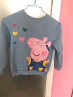 Peppa Wutz Pullover Größe 122/128 hellblau Brandenburg - Neuruppin Vorschau