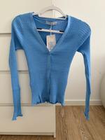Cardigan Strickjacke hellblau mit Wellensaum strahlend Baden-Württemberg - Mühlhausen-Ehingen Vorschau