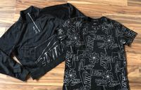 Damen Nike Sport Shirt und Tshirt schwarz silber Gr. M Set Mecklenburg-Vorpommern - Koserow Vorschau