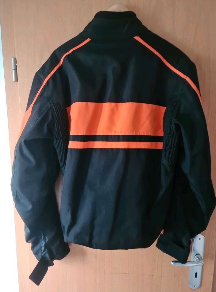 Motorrad Jacke schwarz/orange  gr. M inkl Protectoren in Wiefelstede