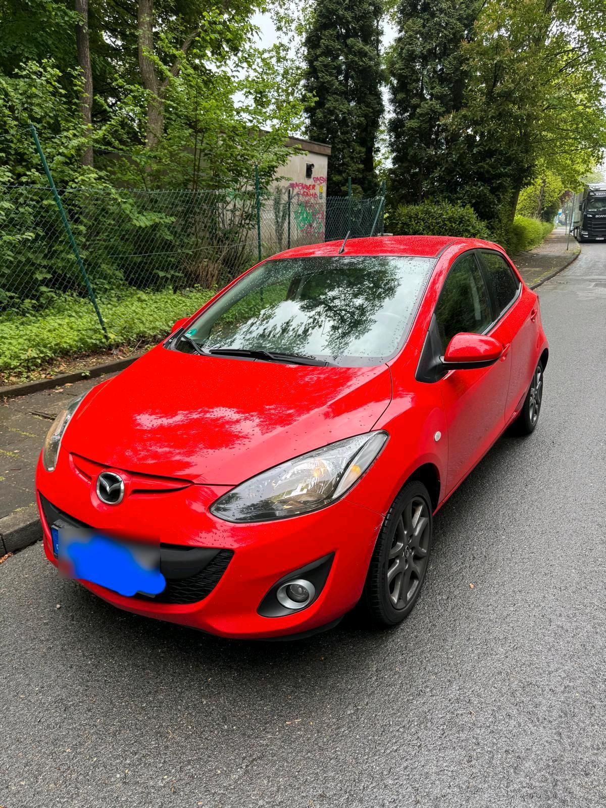 Abbildung des Autos Mazda 2 1.3 benzin 2012.