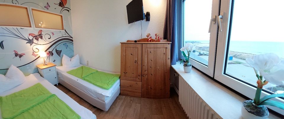 Ferienwohnung am Strand⛱️mit 100% Ostsee Blick, Heiligenhafen in Heiligenhafen 