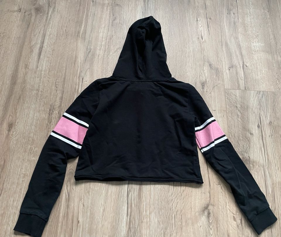 H&M Sweatshirt /Hoodie schwarz-pink 134/140 in Halle (Westfalen)