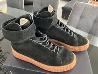 Puma Damenschuhe / Stiefel Schwarz Größe 38,5 Hessen - Niederaula Vorschau