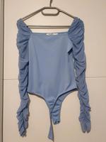 Hellblauer babyblauer Body von NA-KD mit Mesh Ärmeln Münster (Westfalen) - Centrum Vorschau