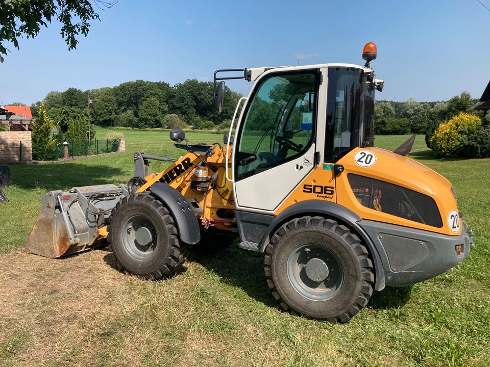 Minibagger Bagger Takeuchi mieten mit Anhänger in Aichach