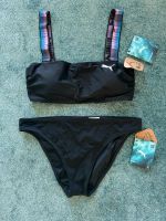 Puma Bandeau Bikini schwarz lila L neu Nordrhein-Westfalen - Mechernich Vorschau