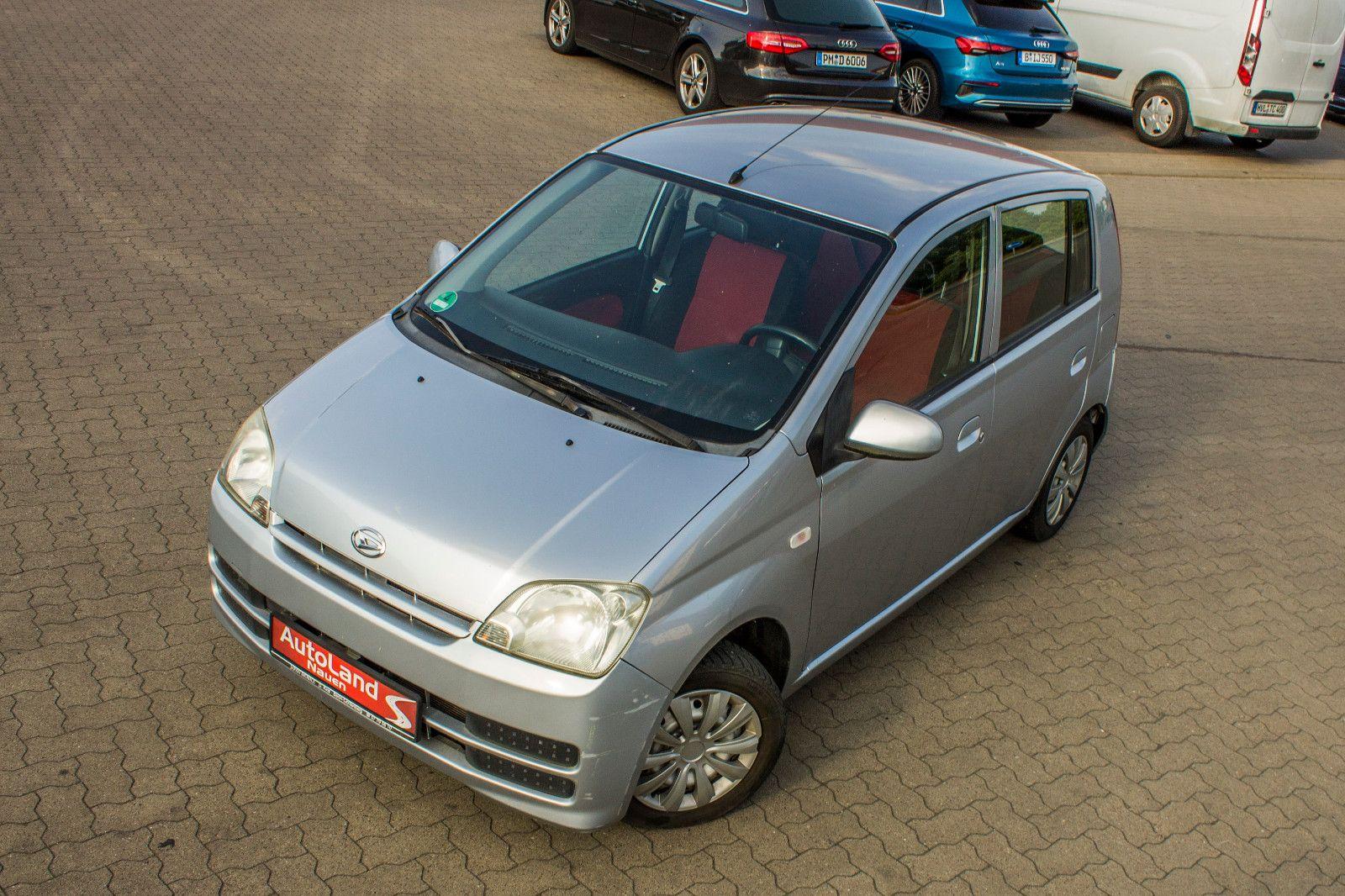 Abbildung des Autos Daihatsu Cuore 1.0 Top+K…