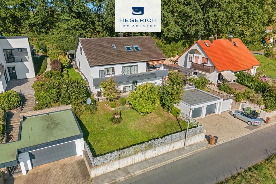 HEGERICH: Wunderschönes Dreifamilienhaus mit Fernblick in Veitsbronn