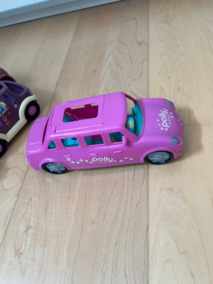 Polly Pocket Autos + zwei Menschen und ein kleiner Helikopter in Hösbach