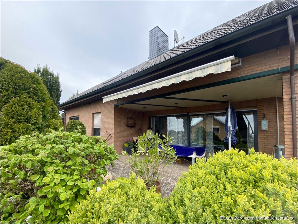 Wohnung kaufen, Hausfeeling genießen - Traumhafte Erdgeschosswohnung mit großem Garten in Wolfsburg