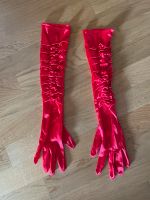 Rote, lange Handschuhe zu verschenken Nordrhein-Westfalen - Warendorf Vorschau