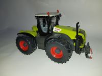 SIKU 1:32 Claas Xerion 5000 Traktor Nr. 3271 Hessen - Nentershausen Vorschau