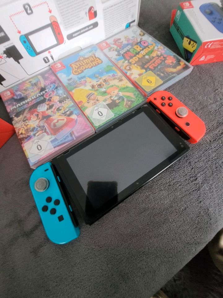 Nintendo Switch mit Zubehör in Windeck