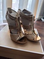 Michael Kors Pumps Berkley T-Strap 9M 39-39,5 high heels gold Niedersachsen - Oyten Vorschau