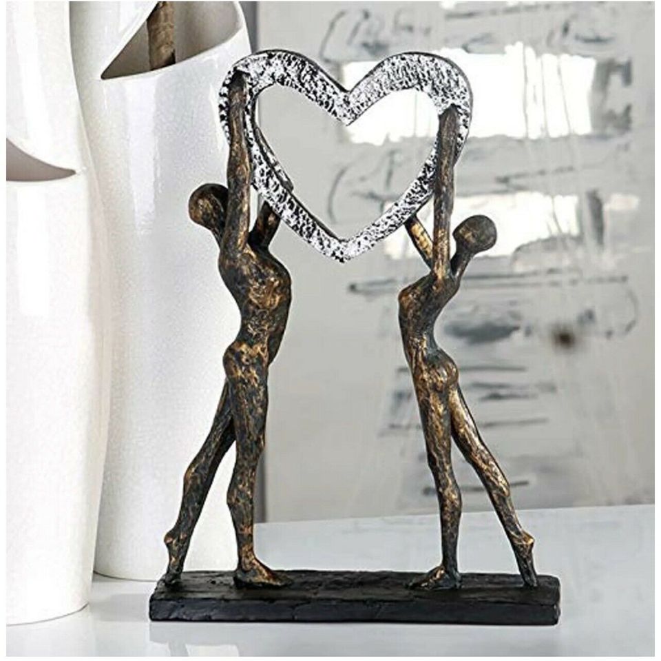 MF Gilde Skulptur LOVE ME bronzefarbenes liebes Paar Herz Figur in Gladbeck