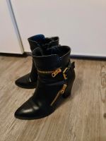 Buffalo Stiefelette in schwarz/gold. Gr. 40. Guter Zustand. Bayern - Eching (Kr Freising) Vorschau