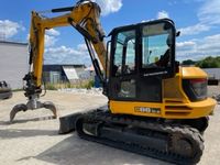 Bagger 9T mit Sortiergreifer Niedersachsen - Hollenstedt Vorschau