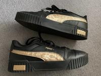 Puma Carina Sneaker schwarz Gold Gr. 42 Niedersachsen - Sehnde Vorschau