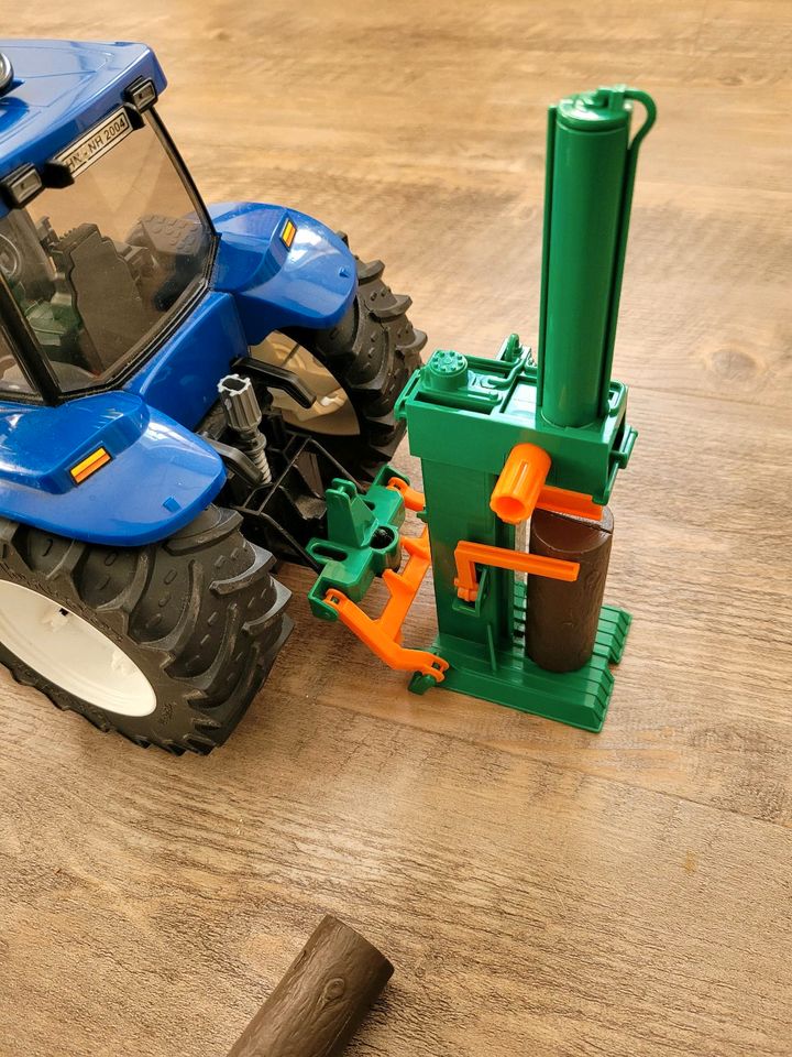 Bruder New Holland Trecker + Zubehör in Niedersachsen - Südbrookmerland