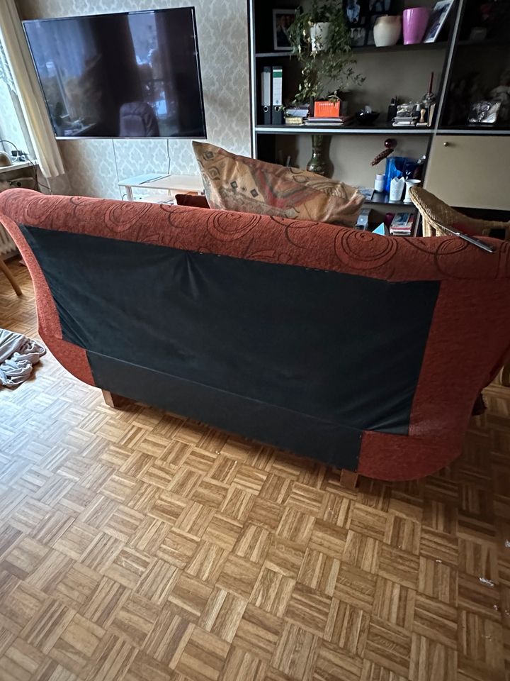 Rotes Aufklappbares sofa mit Bett mit Stauraum in Hamburg